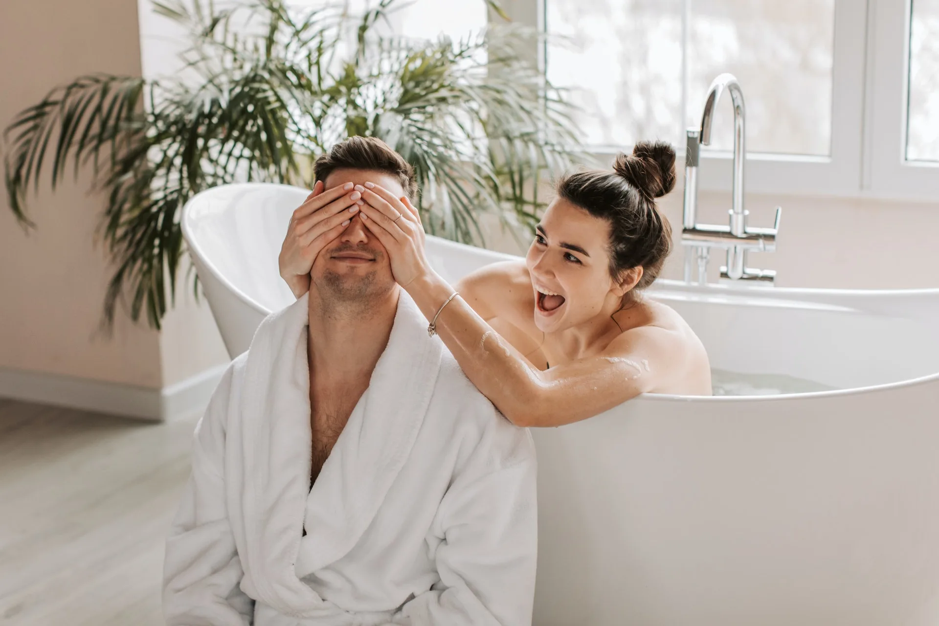 A couple having a romantic bath