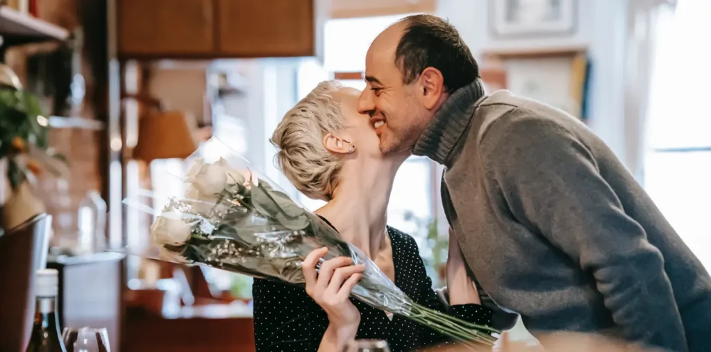 A woman receiving a gift from her husband